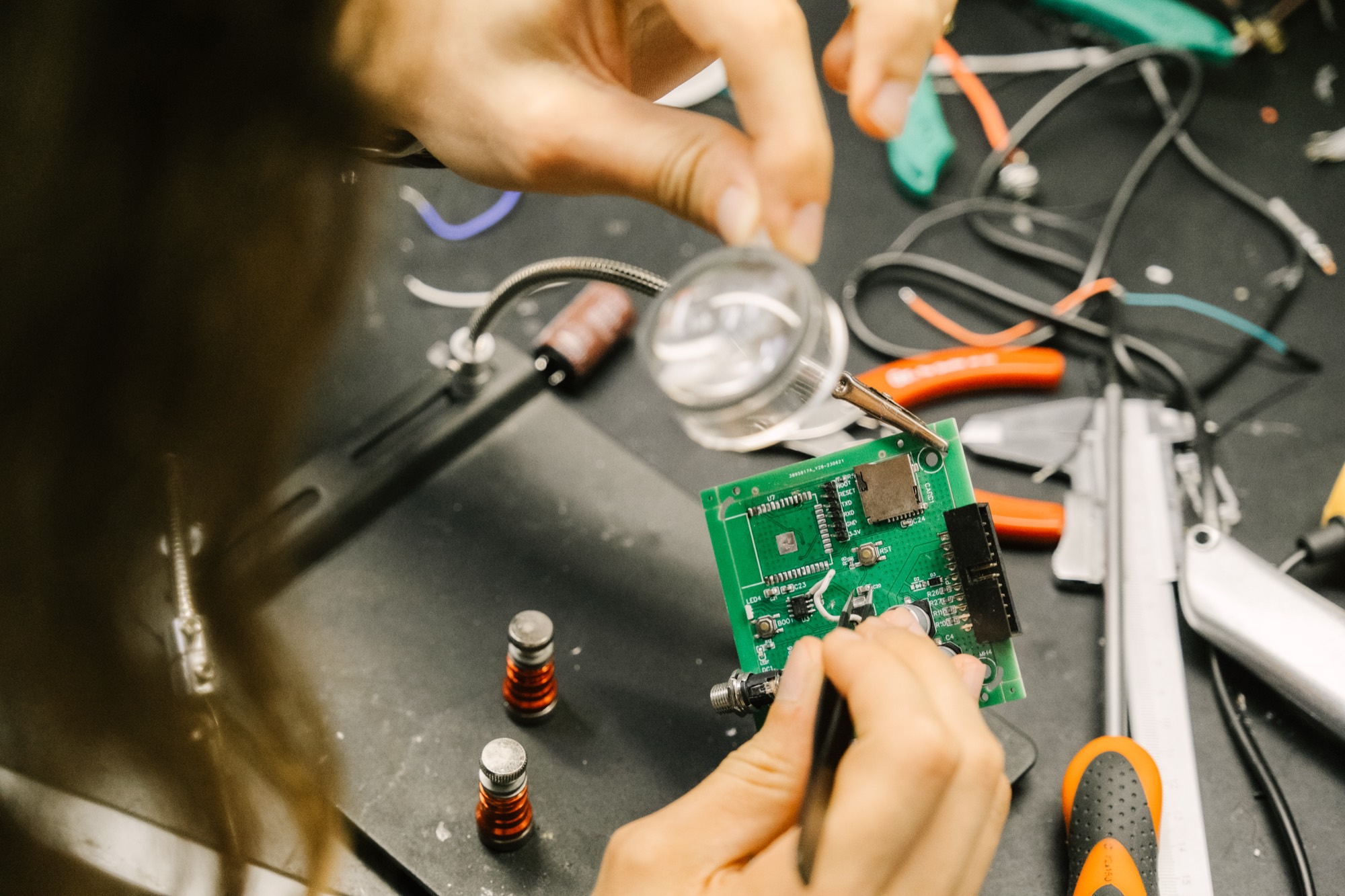 Soldering a circuit board in the embedded lab
